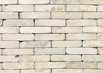 Close up of a wall of bricks of White Linear