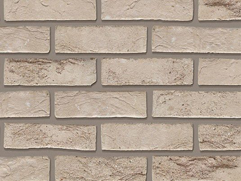 Close up of a wall of Forum Smoked Prata bricks