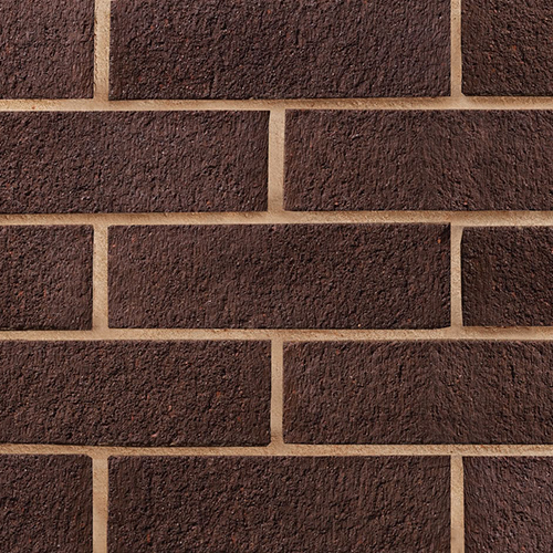 Close up of a wall of Brown Sandfaced 73mm bricks