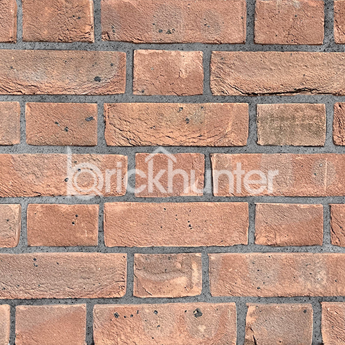Close up of a wall of Grosvenor County Mixture bricks