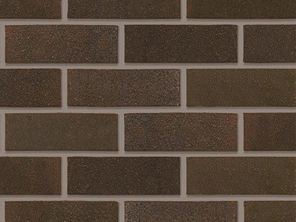 Close up of a wall of Swarland Black 73mm bricks