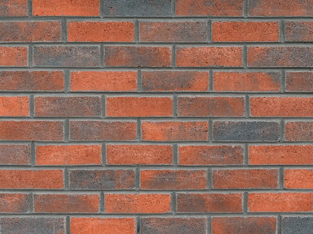 Close up of a wall of Kingston Cottage Red bricks