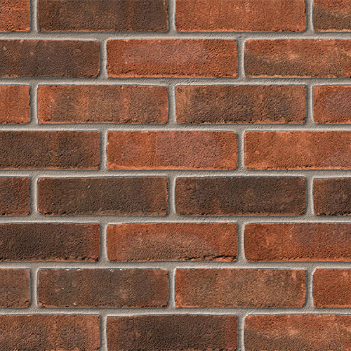 Close up of a wall of Cissbury Red Multi Stock bricks