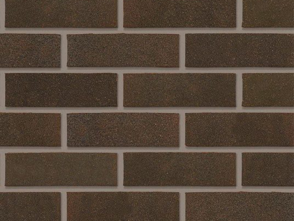 Close up of a wall of Swarland Black bricks