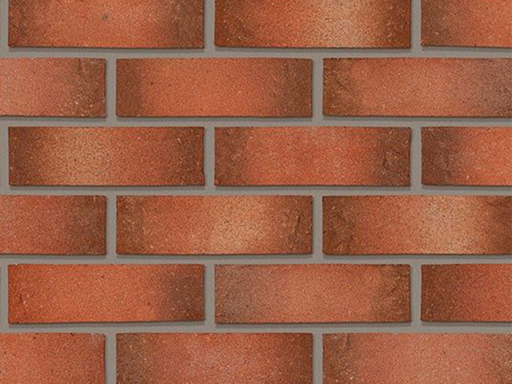 Close up of a wall of Windmill Orange Multi bricks
