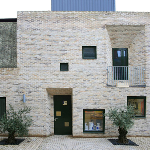 Rear exterior of a house built using St Ives Cream Rustica bricks