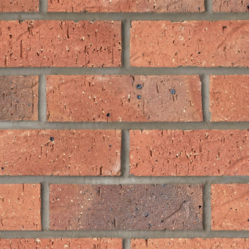 Close up of a wall of Cadeby Red Multi bricks