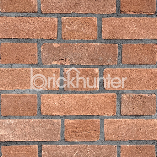 Close up of a wall of Waresley Orange Stock bricks