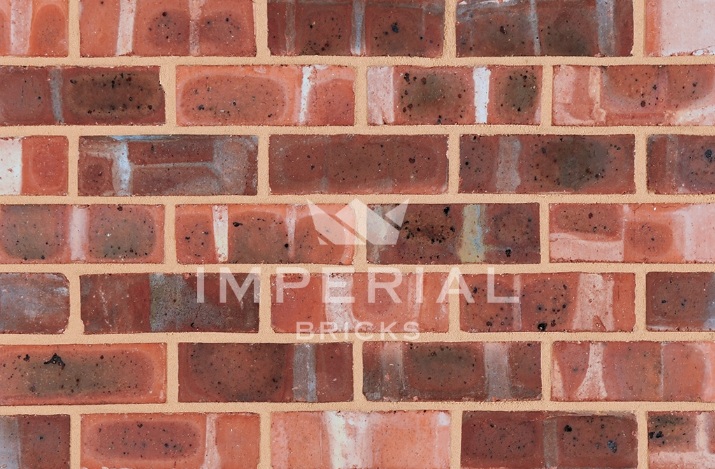 Close up of a wall of Weathered Cheshire Pre War bricks